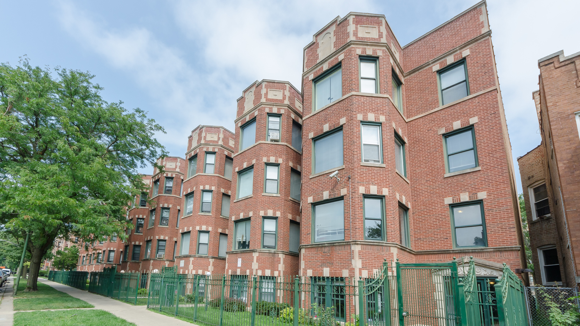 6901-17 S Paxton Ave / 2211-17 E 69th St - 2215-2
